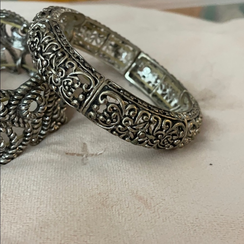 Three Silver Bangle bracelets
